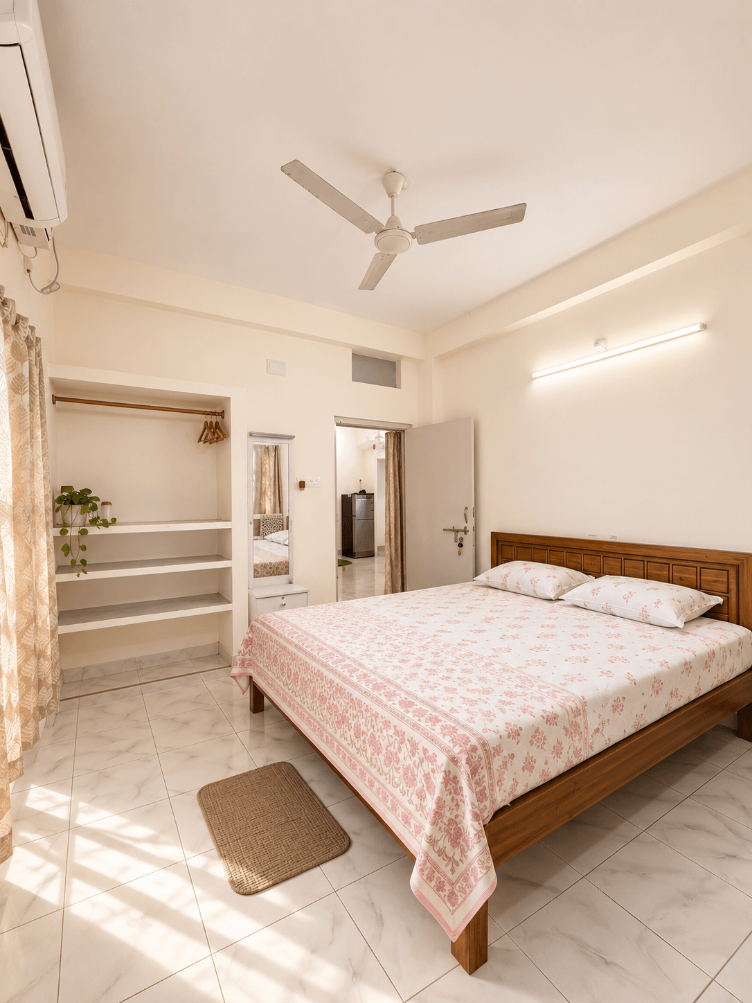 A king room at Casa Blanca, with a king bed and attached bathroom